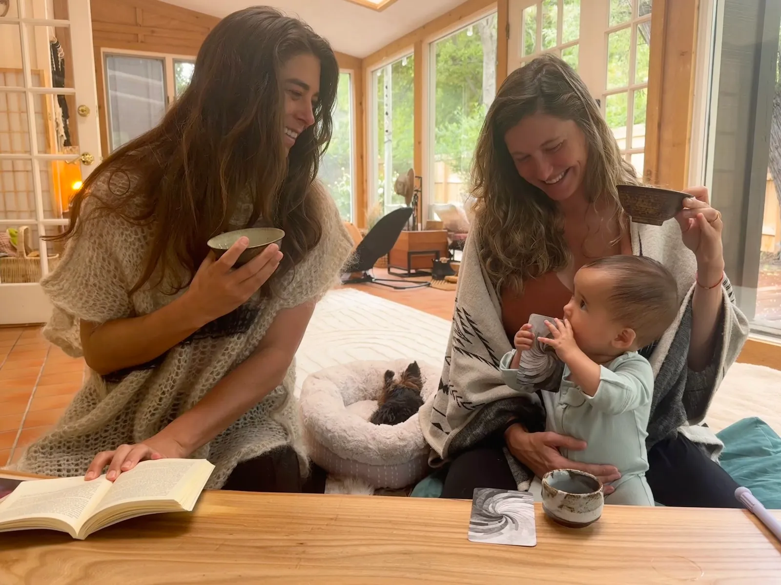 Jess and Kiki sharing tea